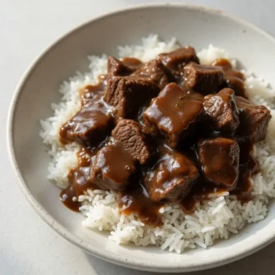Slow Cooker Beef Tips And Gravy Over Rice
